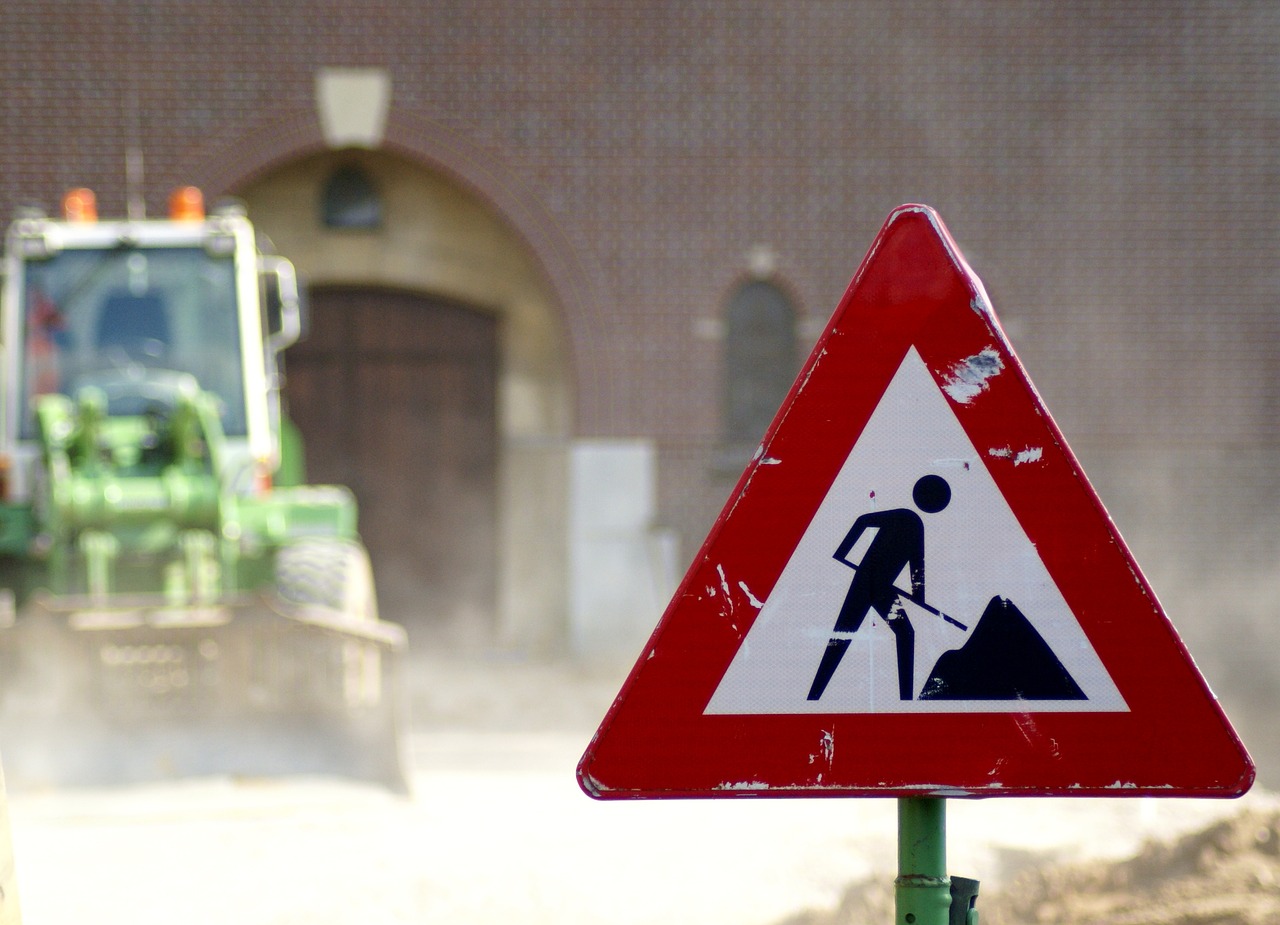 work  road sign  excavators free photo