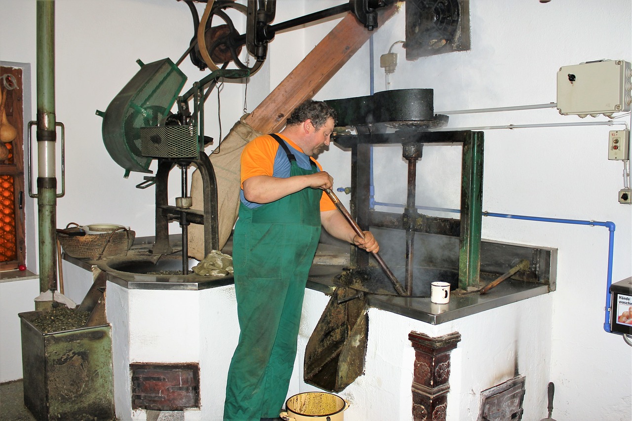 working oil mill manufacturing hand labor free photo