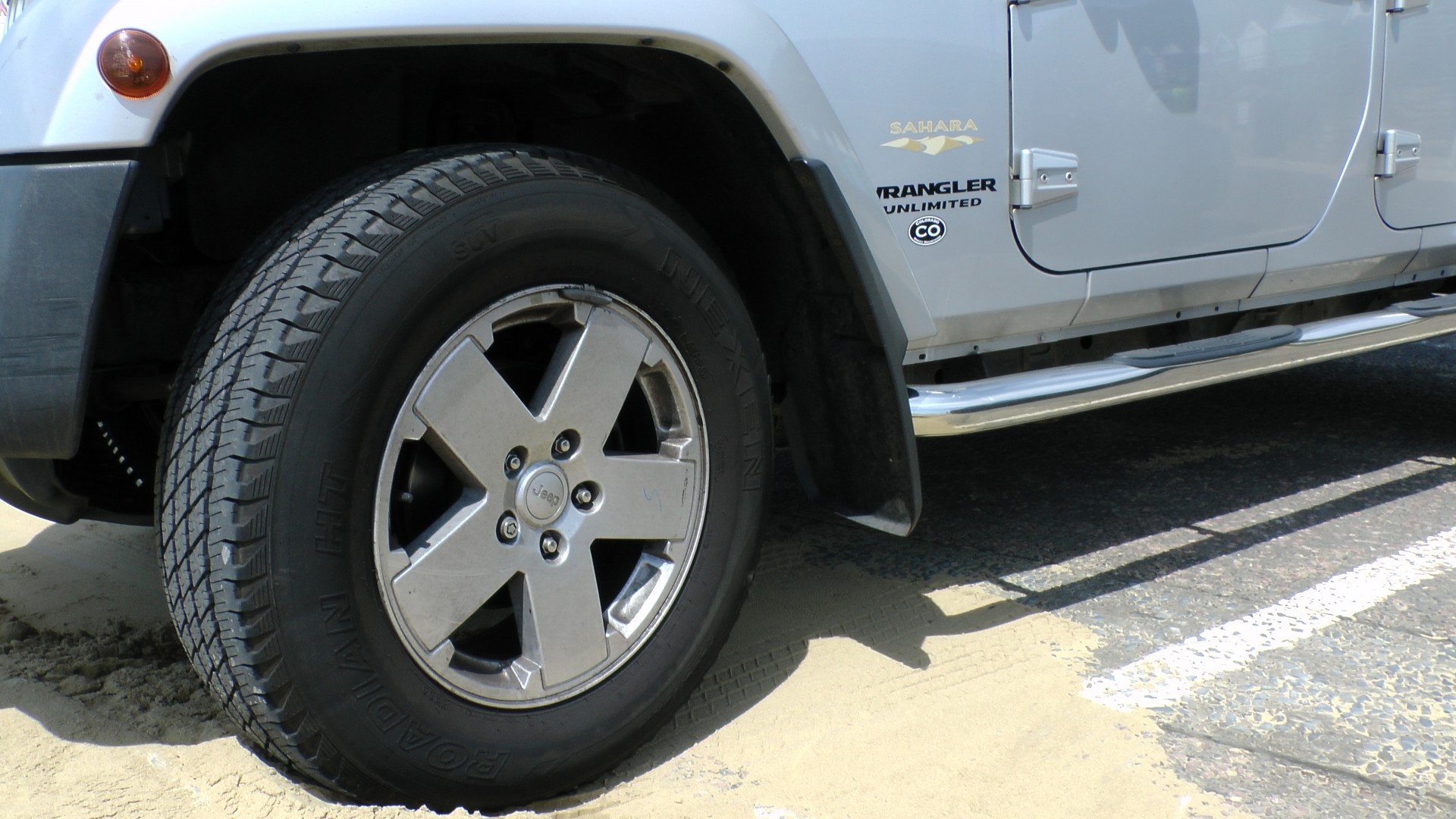 cars wrangler sahara jeep front wheel wrangler jeep free photo