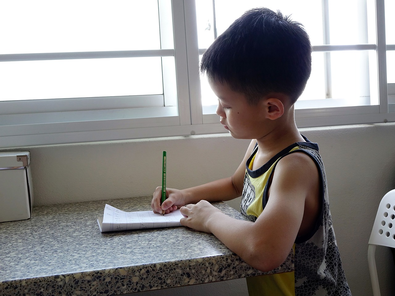 writing boy child free photo