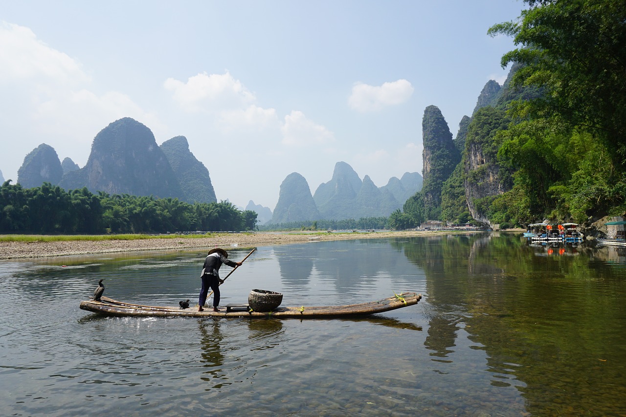 xingping  bamboo raft  fishman free photo