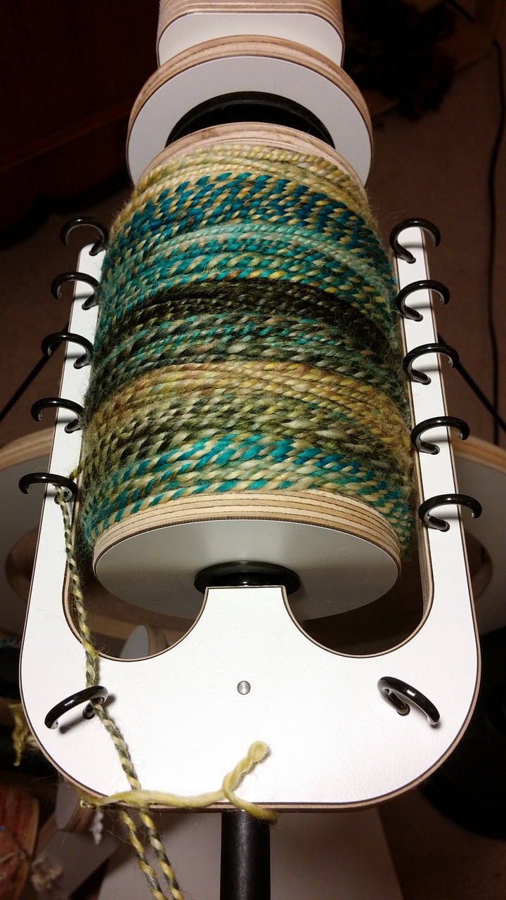 yarn spinning bobbin free photo