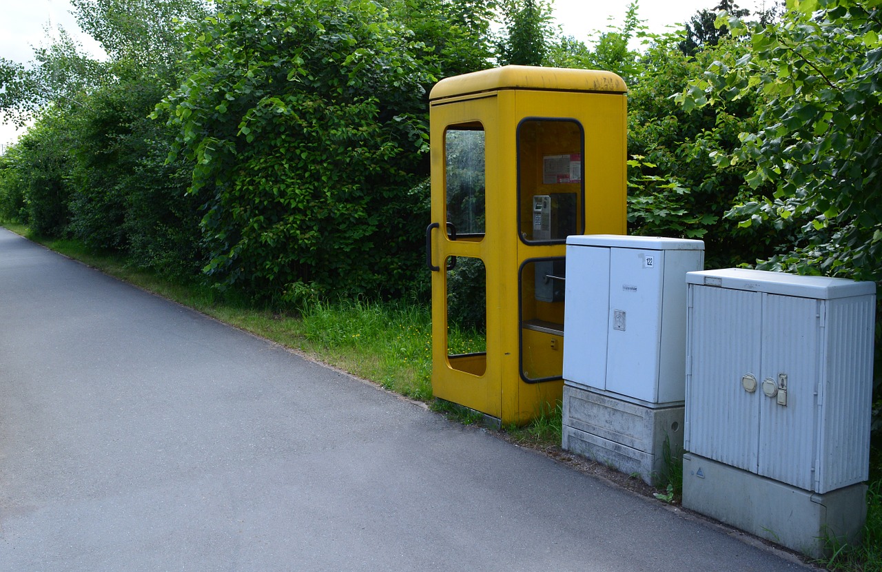 yellow phone phone booth free photo