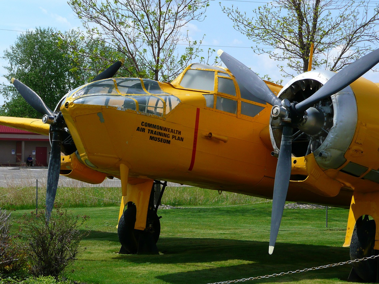 yellow two engine propeller plane free photo