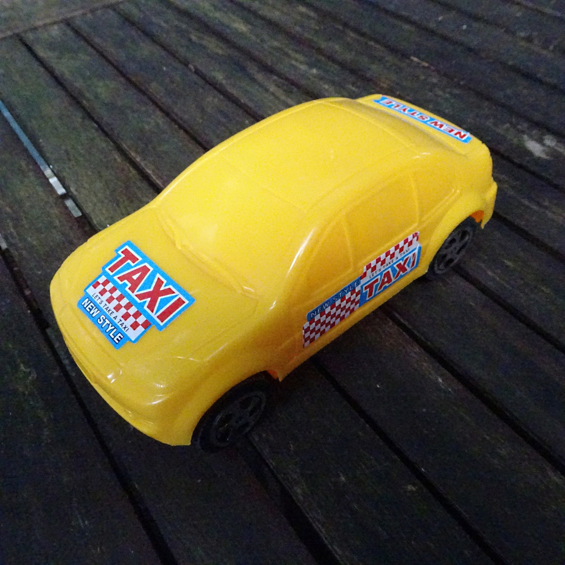 yellow taxi toy free photo