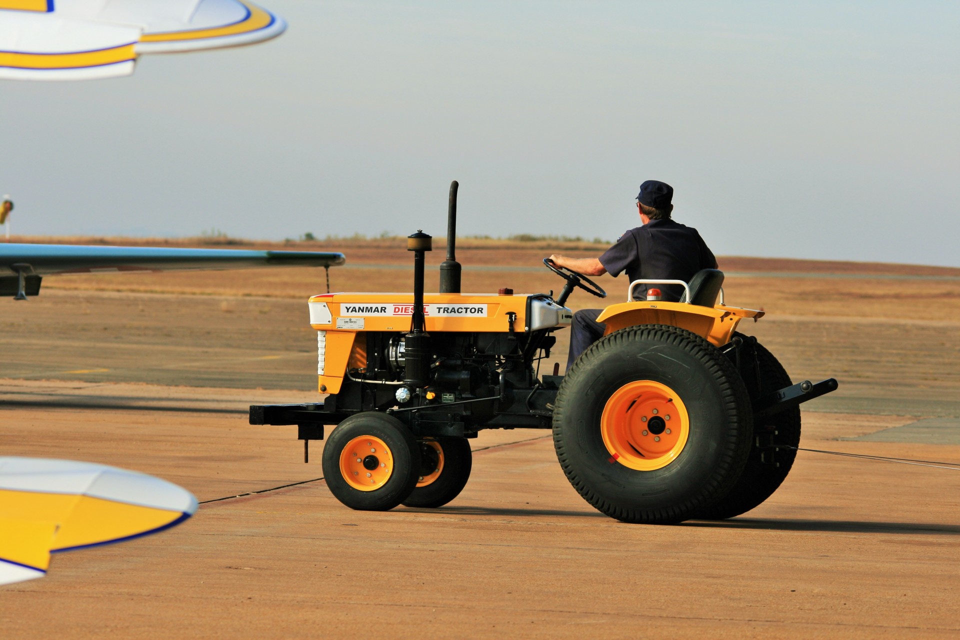 tractor yellow moving aircraft free photo