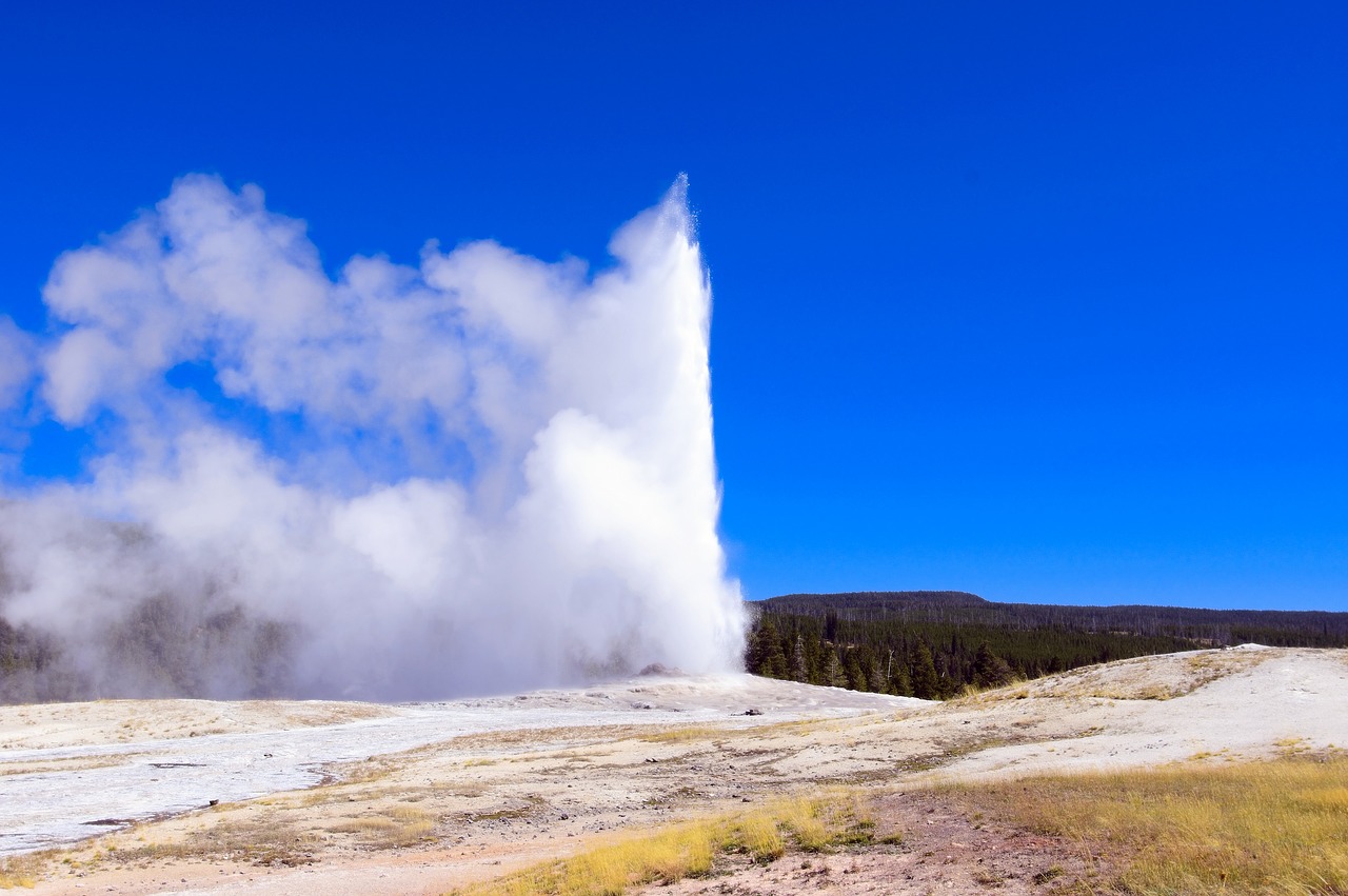 yellowstone's old faithful  upper  geyser free photo
