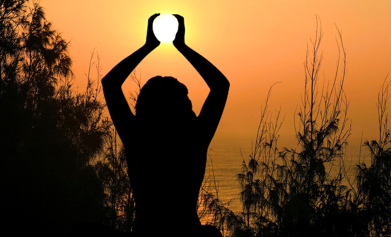 yoga  sun  meditation holding free photo