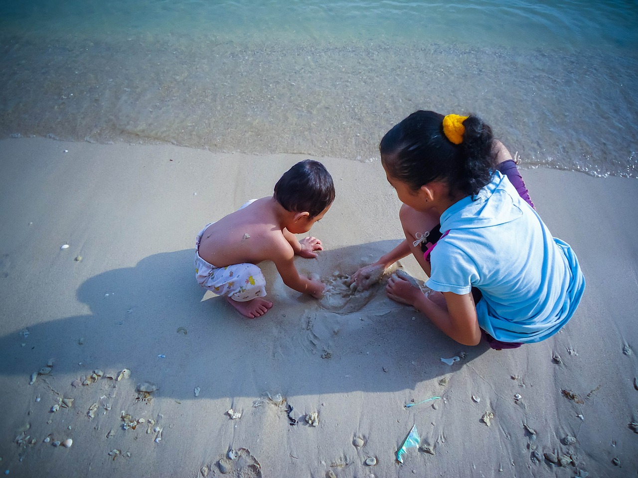 young children play sand free photo