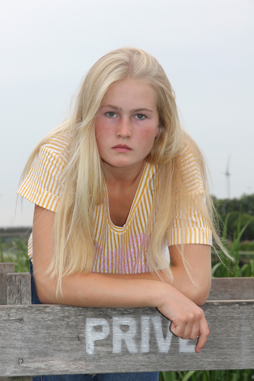 young girl  water  blonde free photo