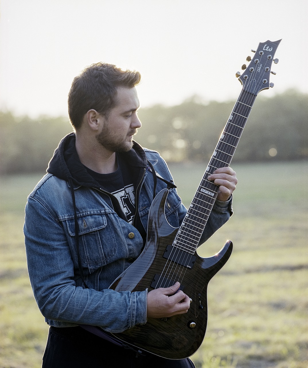 young man guitarist man free photo