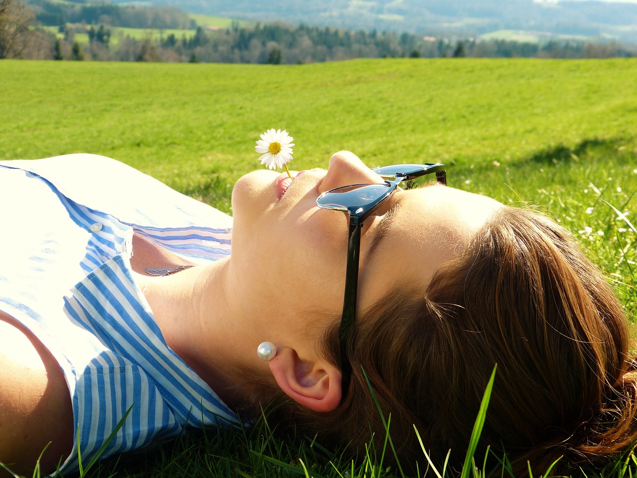 young woman meadow concerns free photo