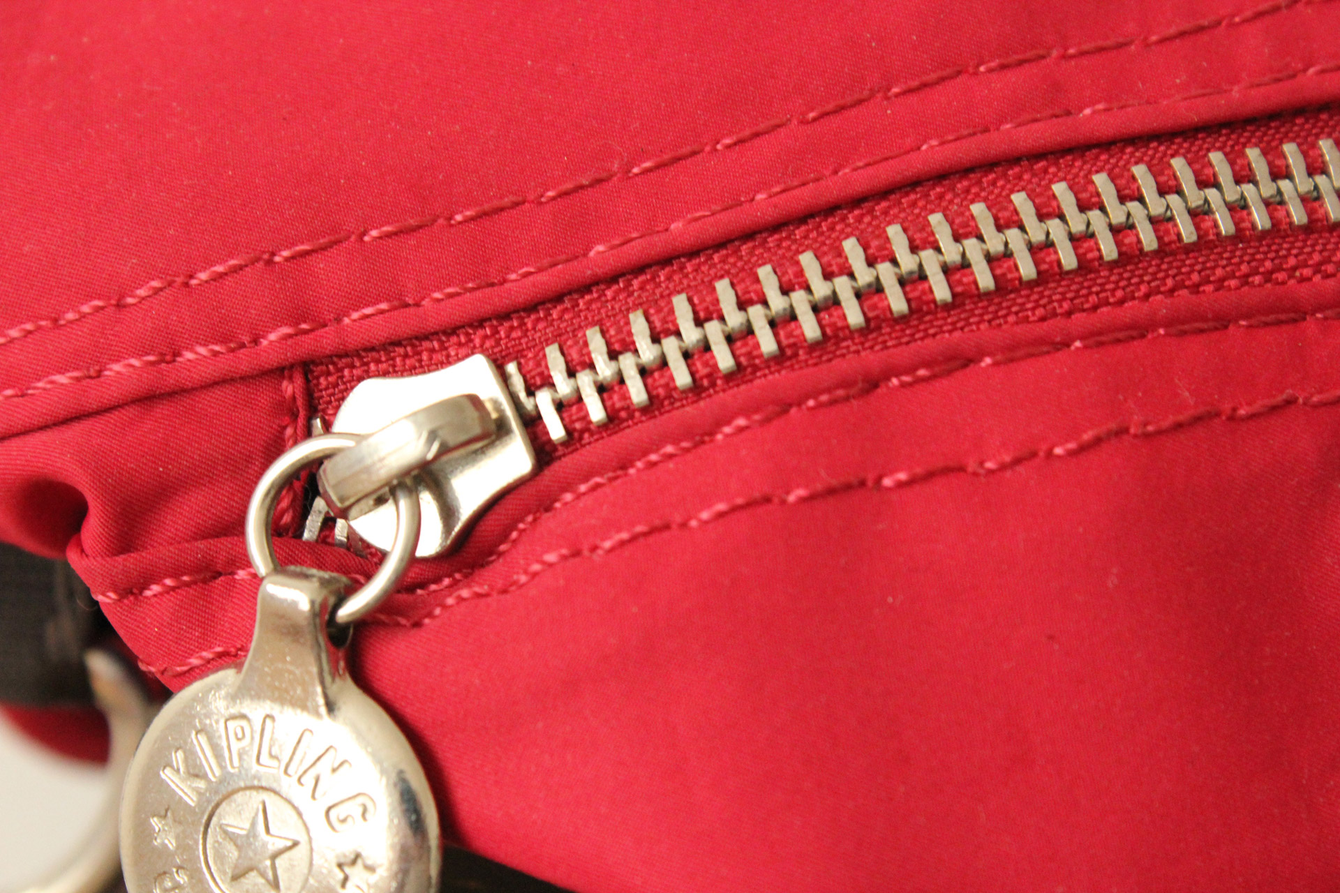 red zipper zipper object free photo