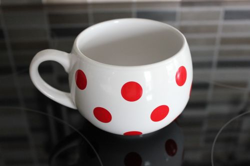 a cup of ceramics dot
