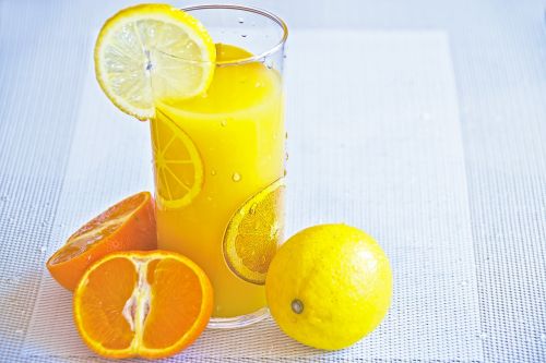 a glass of juice fruit juice juicy citrus