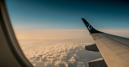 a plane clouds sky