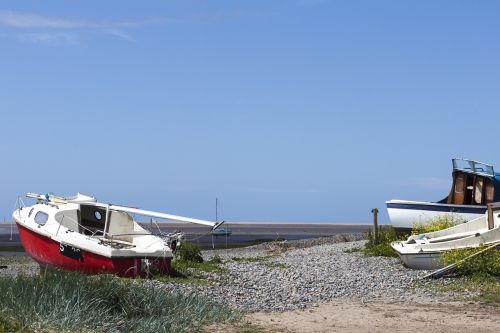 abandoned boat coast