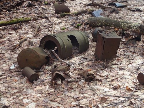 abandoned barrel rust trash