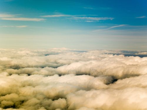 above the clouds blue sky