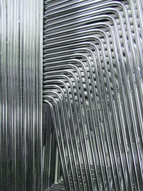 abstract stacked chairs metal