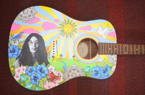 acoustic guitar hippie guitar