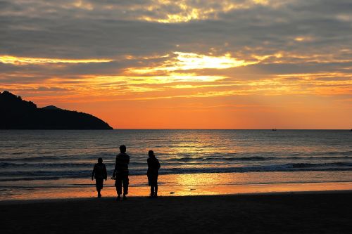 family sunset beach