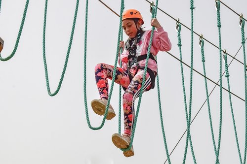 adventure park  ropes  girl