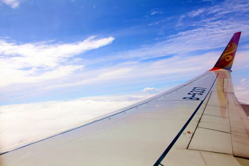 aircraft wing blue sky