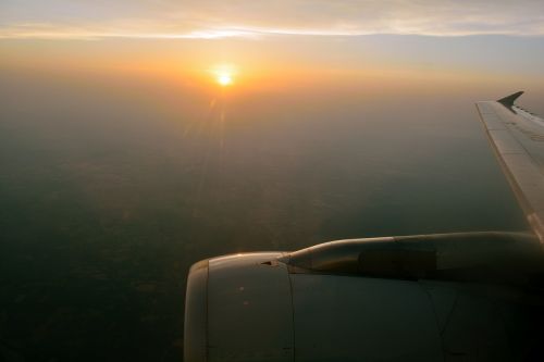 aircraft fly sunset