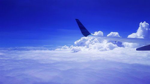 aircraft  flying  clouds