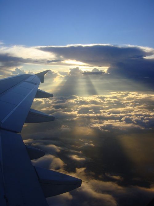 aircraft sunrise clouds