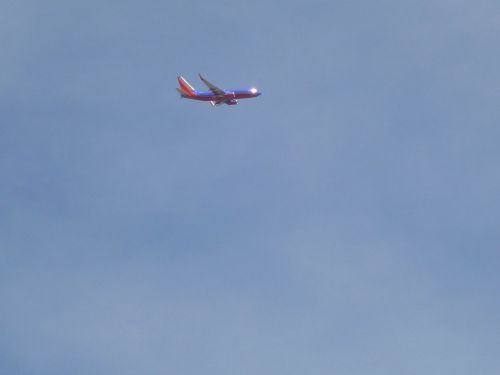 airplane clouds sky