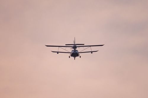 airplane flight sunset