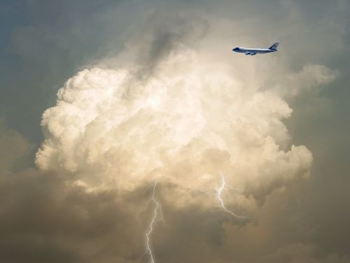 airplane clouds lightning