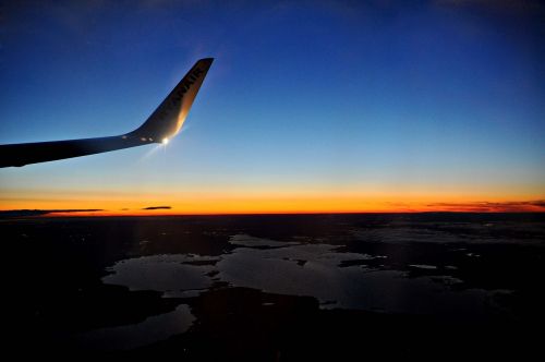 airplane travel sunset