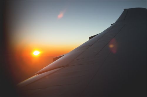 airplane wing sunset