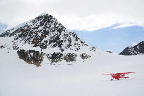 airplane glacier mountains