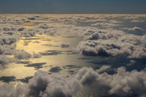 airplane view  clouds  sea