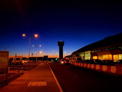 airport control tower sunset