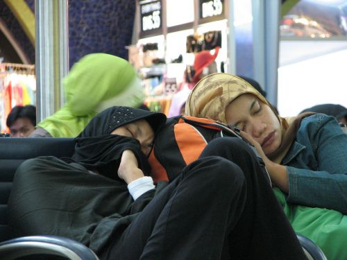 airport passenger sleeping