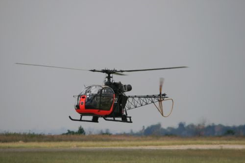 Alouette Ii Helicopter Flying In