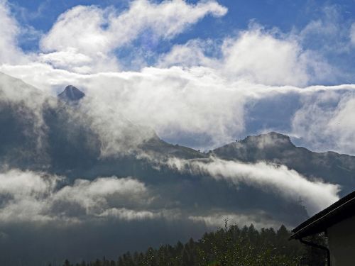 alpine morning mist clouds