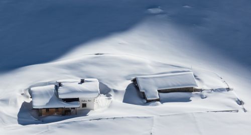 alpine hut winter snow