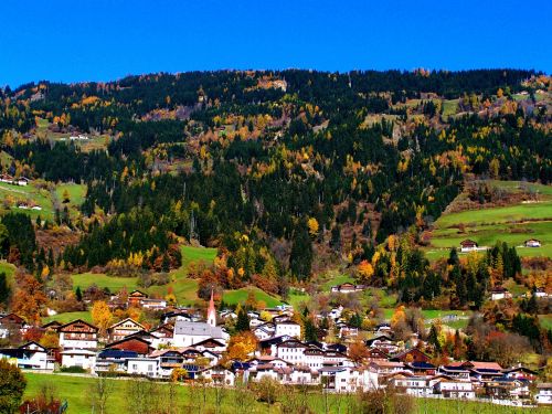 alpine village landscape blue sky