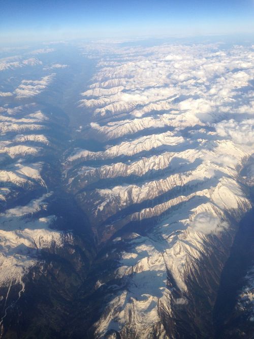 alps snow-capped peaks flight