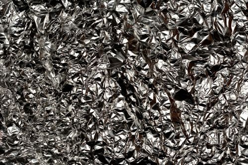 aluminum foil dark crumpled