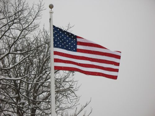american flag winter snow