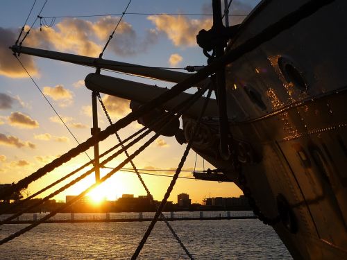 amsterdam ship sunset