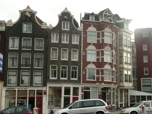 amsterdam row of houses crooked house
