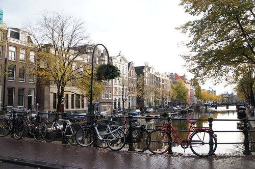 amsterdam bridge  bikes  amsterdam canal